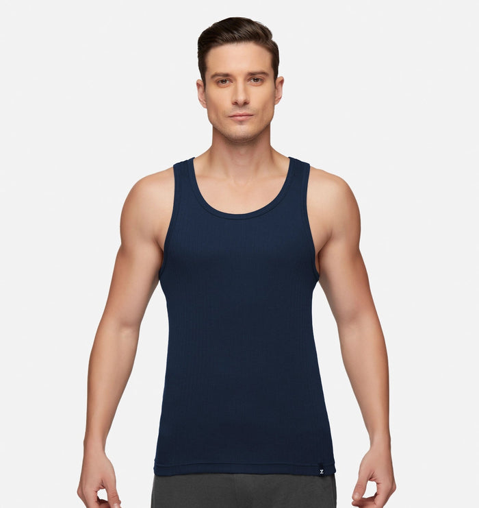 blog-article-image-white-vests-vs-coloured-fashion-vests-which-works-better-for-men-in-summer